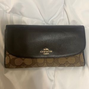 Authentic.  Trifold coach wallet